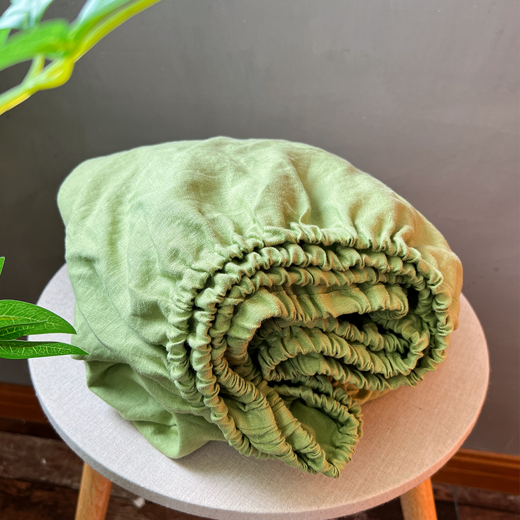 Green Tea Folded On Chair - linenshed