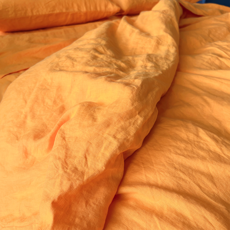 Close Up View Of Orange Linen Duvet Cover - linenshed AU