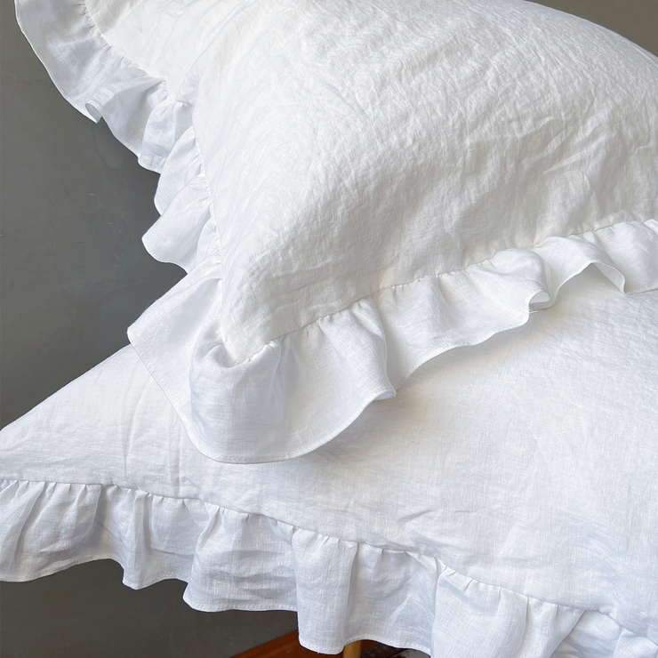 Side View of Ruffle Linen Pillowcases On Chair - linenshed